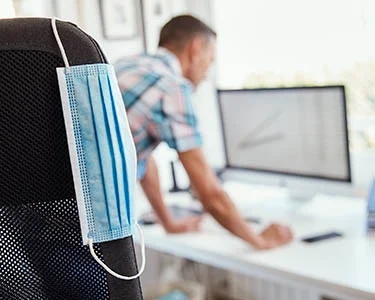 If Masks Come Off, Will Workers Come In?